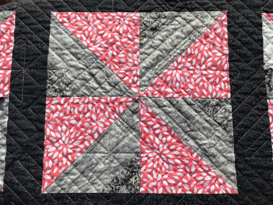 Quilted windmill throw