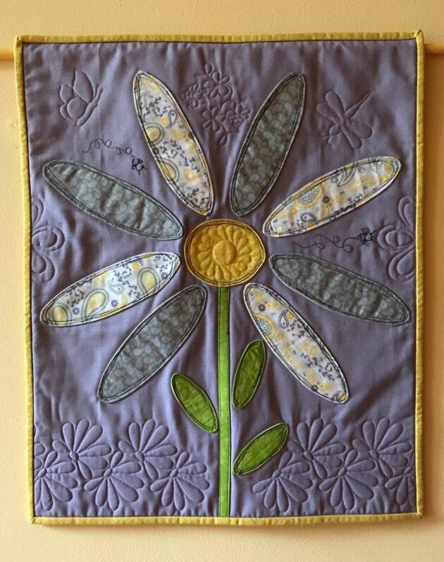 Appliqued wall hanging