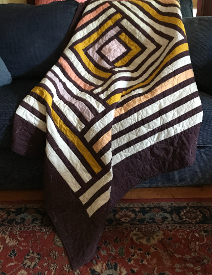 Geometric quilted throw