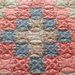 Single bed patchwork quilt in the Trip Around the World Pattern