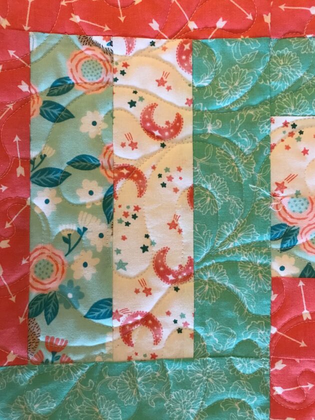 pink and green baby quilt
