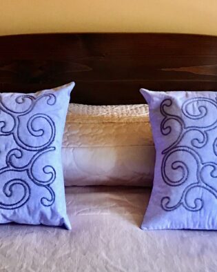 Cushion covers with couching