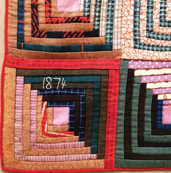 image of an early American log cabin quilt block