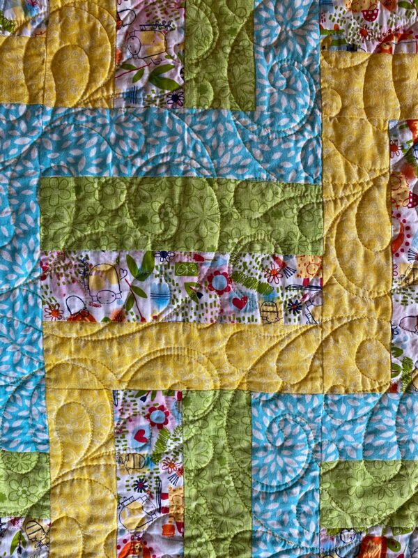 blue, green and yellow baby quilt