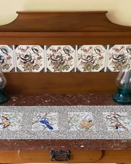 quilted table runner with six bird images