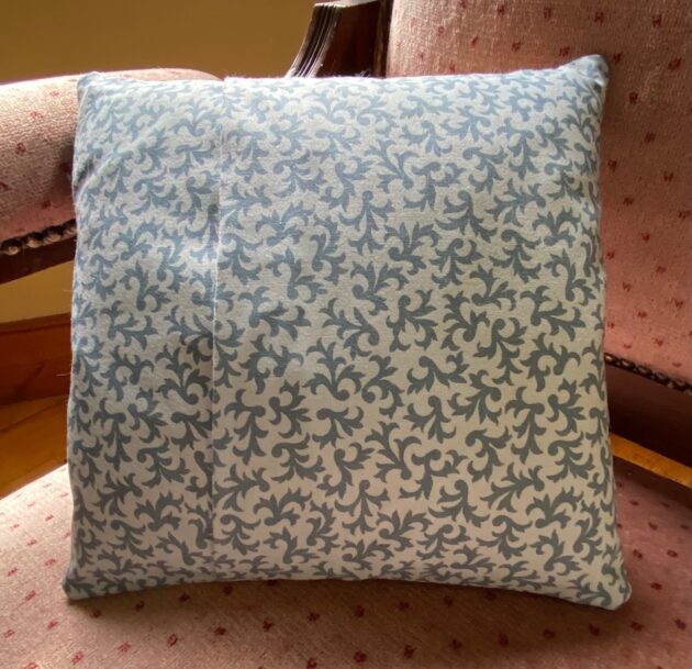 back of old-fashioned look cushion with envelope closure