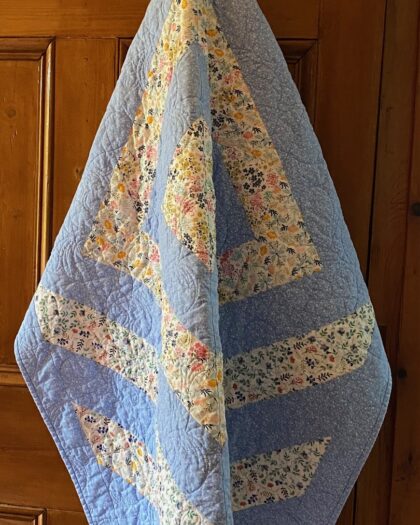 flowery blue baby quilt