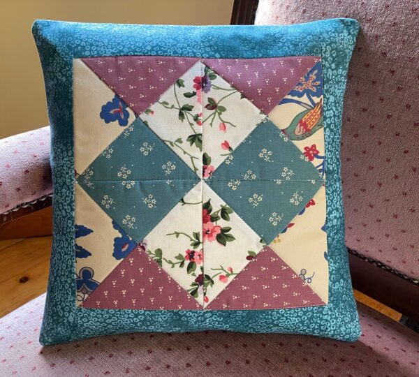 patchwork cushion measuring 35 cm square