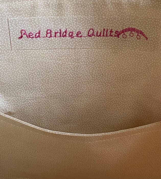 quilted tote bag with interior pocket