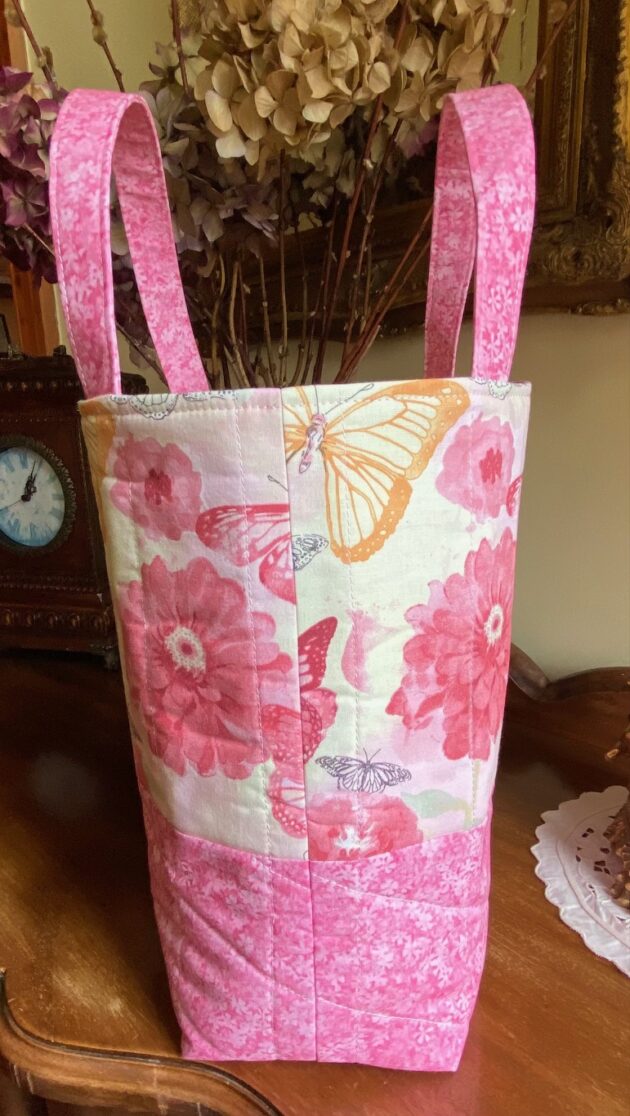 Side view of a quilted tote bag