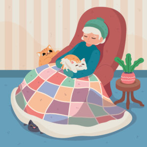 a grandmother sitting in a chair with a quilt and a cat on her lap
