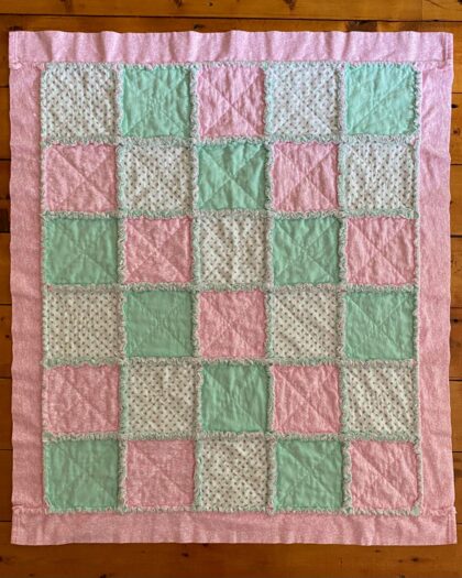 Soft pink and mint green cotton rag quilt for baby
