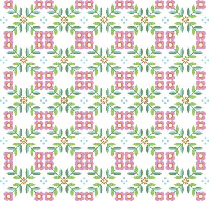 image of quilt with a pink and green floral on a white background folksy pattern